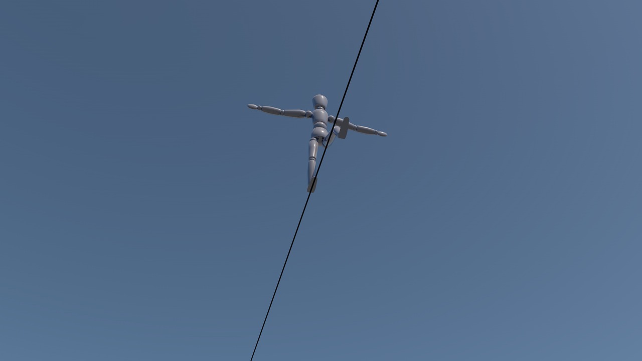 Puppe auf dem Drahtseil